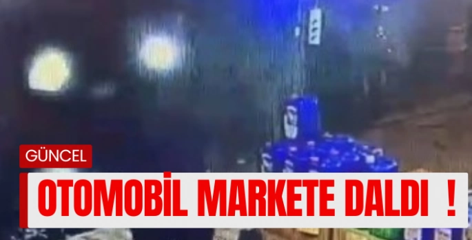 Otomobil markete daldı, ezilmekten son anda kurtuldu